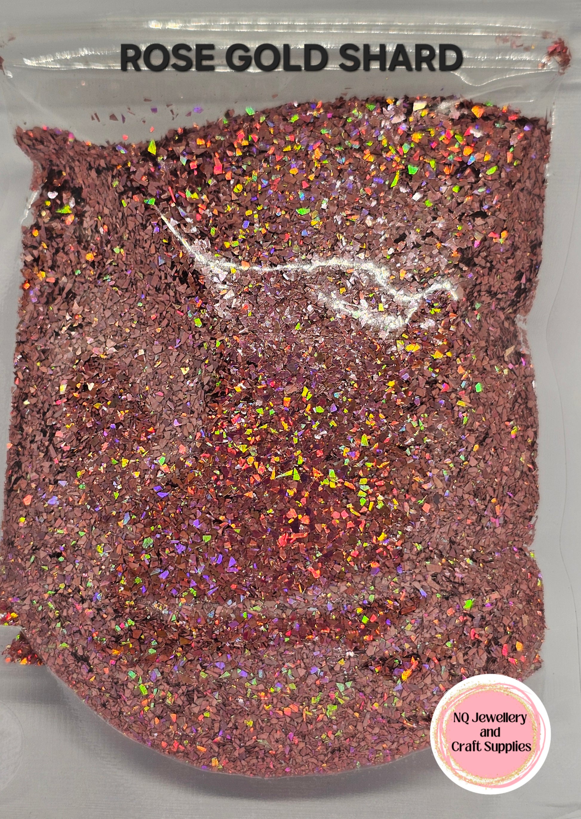 Rose gold shard with colorful glitter on a gray background, labeled 'No Jewelry and Craft Supplies'.